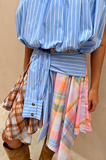 Check Asymmetric Mini Skirt with mixed check prints, a blue stripe tie-waist detail and an asymmetric hanky hem.