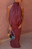 Chocolate Daphne Skirt in a high-waisted straight silhouette, paired with a matching halter neck top.