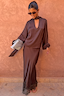 Thumbnail for Chocolate Tie Neck Blouse with volume sleeves and a multi-wear neckline, paired with a matching lace-trim skirt.