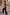 Thumbnail for Chocolate satin-esque wide leg trousers with blue lace trim, styled as a co-ord on a model walking up stone steps.