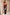 Thumbnail for Chocolate satin-esque wide leg trousers with blue lace trim, styled as a co-ord set against a textured stone wall.