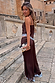 Chocolate wide-leg satin-feel trousers with blue lace trim, designed in London and styled as a co-ord on vacation.