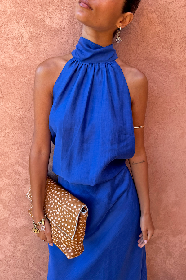 Cobalt Billie Top featuring a high halterneck and front gathers, styled as a co-ord on a model.