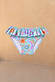 Girl's blue Starburst print bikini bottoms featuring a frill waistband and colourful star motifs.