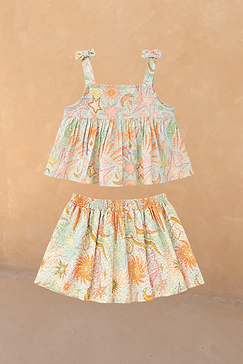 Girl's Starburst Skirt Co-ord Set in blue cotton with a peplum tie-strap top and tiered sun and star print skirt.