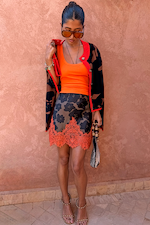Coral Scoop Neck Rib Tank in soft stretch rib, styled with a patterned lace trim mini skirt and draped cardigan.