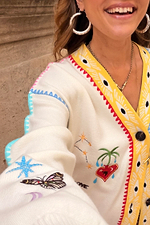 Cream Celestial Martha Cardigan in soft touch knit with butterfly, constellation and heart motifs.