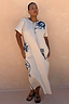 Cream cotton Dolce Vita T-Shirt Dress featuring blue hand-painted Greek motifs and a multi-wear neckline.