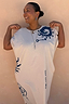 Cream Dolce Vita T-Shirt Dress in cotton with blue hand-painted sun motifs, highlighting inclusive sizing.