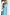 Thumbnail for Blue Stripe Kiki Top with multi-wear puff sleeves and a peplum hem, worn by a model against a white archway.