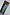 Thumbnail for Blue Stripe Kiki peplum top and matching wide-leg trousers on a model in a white doorway on vacation.