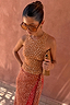 Thumbnail for Fawn Rib Tank Top featuring white spots on tan ribbed fabric, styled with a matching wrap skirt.