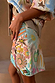 White Star Beaded Dreamer Skirt with hand-embroidered pastel sun and star motifs in glass beads.