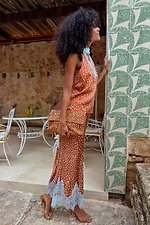 Fawn print Maeva midi skirt with a blue lace border, paired with a matching halter top co-ord.
