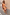 Thumbnail for Floral Mini Sophie Dress in a retro orange print with a cowl neckline, asymmetric hem and silver metallic flats.