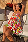 White Fruit Stamps Cotton Mini Dress with a Mediterranean-inspired fruit print and tiered silhouette for a summer vacation.