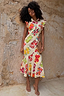 Thumbnail for Fruit Stamps Remi midi dress in a cotton-linen blend with a vibrant fruit print, ruffle sleeves and button collar.