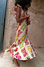 Thumbnail for Fruit Stamps Remi Midi Dress in white cotton-linen with ruffle sleeves and a vibrant fruit sticker print.