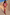 Thumbnail for Pink Fruit Tilly Dress featuring a citrus fruit print, metallic fleck and an off-shoulder midaxi silhouette.