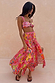 Pink Fruit Stamps Skirt with a Mediterranean fruit print, shirred waistband and side split for a vacation look.
