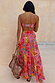 Pink Fruit Stamps Skirt with a Mediterranean fruit print and shirred waistband, styled with a matching bikini top.