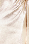 Close-up of the textured metallic gold vegan leather fabric on the iconic Jaspre wrap skirt.