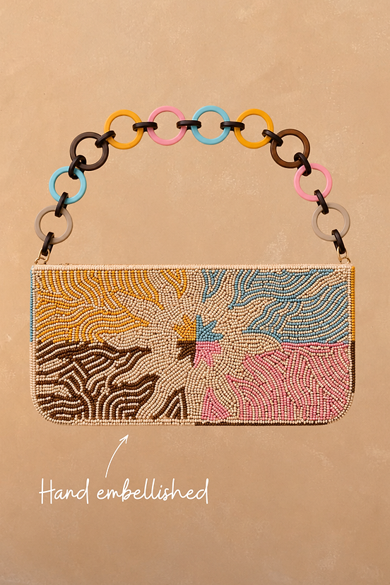 Soleil Bag with hand-embellished beads in pastel tones and a colourful circular link strap.