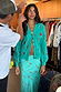 Thumbnail for Turquoise Key Dorris Skirt and matching cardigan with a gold key print, styled on a model on set.