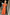 Thumbnail for Orange Jacquard Bibi Dress featuring gold threads and puff sleeves in a smock silhouette on a model.