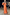 Thumbnail for Orange jacquard Bibi maxi dress with gold diamond details and puff sleeves, shown in a studio mirror selfie.