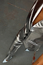 Silver Vegan Leather Trousers and matching waistcoat styled with light blue heels for a metallic street-style look.