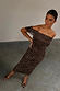 Leopard Diaz Dress in iconic leopard print mesh featuring ruched side detailing and an off-the-shoulder neckline.