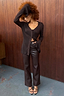 Thumbnail for High-waisted brown vegan leather trousers with a straight leg, paired with a chocolate brown knit top.