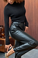 Black Vegan Leather Trousers with a high waist and straight leg, styled with a black knit top and leopard print heels.