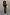 Thumbnail for Khaki Vegan Leather Trousers paired with a dark green jumper and leopard print trainers.