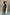 Thumbnail for Khaki Vegan Leather Trousers paired with a beige trench coat and leopard print bag for a London look.