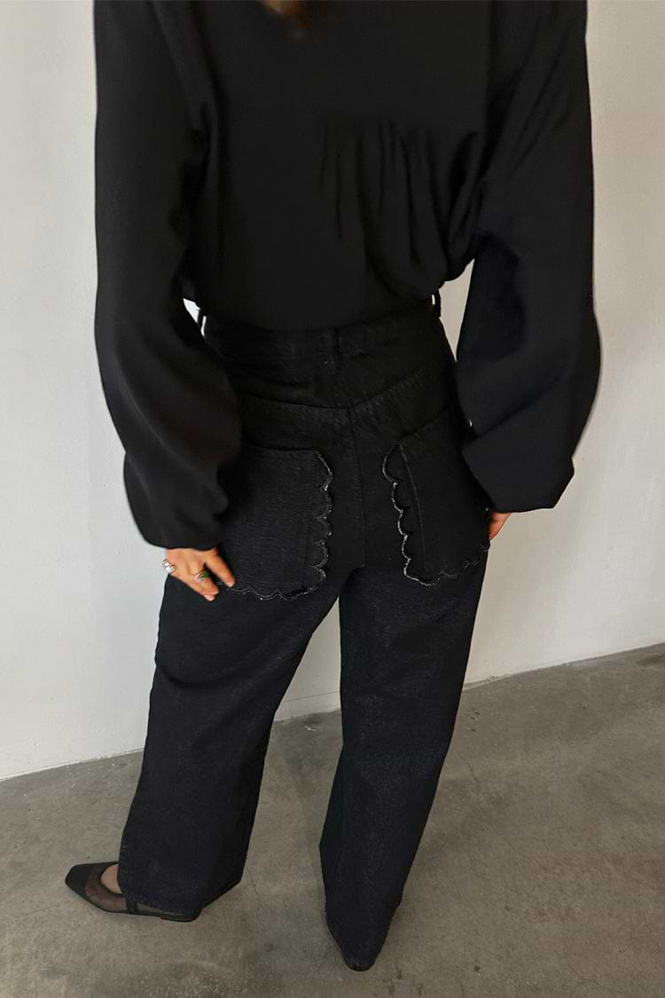 Black Scallop Detail Jeans featuring scalloped back pockets and a wide leg silhouette in denim.