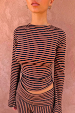 Ribbed Chocolate Stripe Top with a high neck and long sleeves, paired with matching striped trousers.