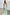 Thumbnail for Blue Fawn Poppy Elsie slip dress with yellow poppy and fawn spot prints, styled with a beaded bag.