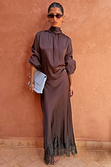 Chocolate Maeva Skirt, a bias-cut chocolate brown wardrobe staple with a black lace border at the hem.