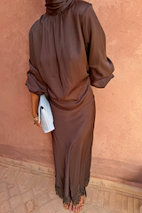 Chocolate Maeva Skirt with black lace trim and matching high-neck blouse, styled as a co-ord with a blue clutch.