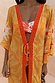 Yellow Sun Kimono in Soleil print with orange lace trim and tie front detail over matching swimwear.
