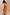 Thumbnail for Yellow Sun Kimono in Soleil print with orange sun motifs, wide sleeves and side splits for vacation.