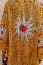 Back detail of the Yellow Sun Kimono showing the beaded sun motif and Soleil print.