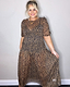 Leopard Lucia Sheer Dress in iconic leopard print with short sleeves and a low waistline, showcasing curve fashion.