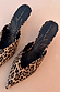 Leopard Heel Mules in a classic animal print with a pointed toe and gold logo detailing on black insoles.