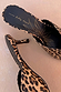 Leopard print leather mules with a 5.5cm heel, gold sun graphic and Never Fully Dressed logo on the inner sole.