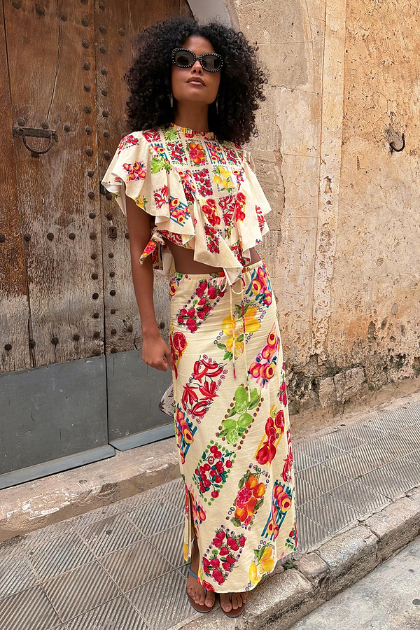 Cream Fruit Stamps Mabel Skirt with a Mediterranean citrus print, cotton-linen blend, and drawstring waist.