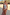 Thumbnail for Morocco Print Swimsuit designed in London with swirling pink and blue motifs and a belted ring detail, on a beach vacation.