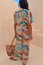 Wide-leg Morocco Trousers featuring a celestial patchwork print, worn as a matching co-ord set.